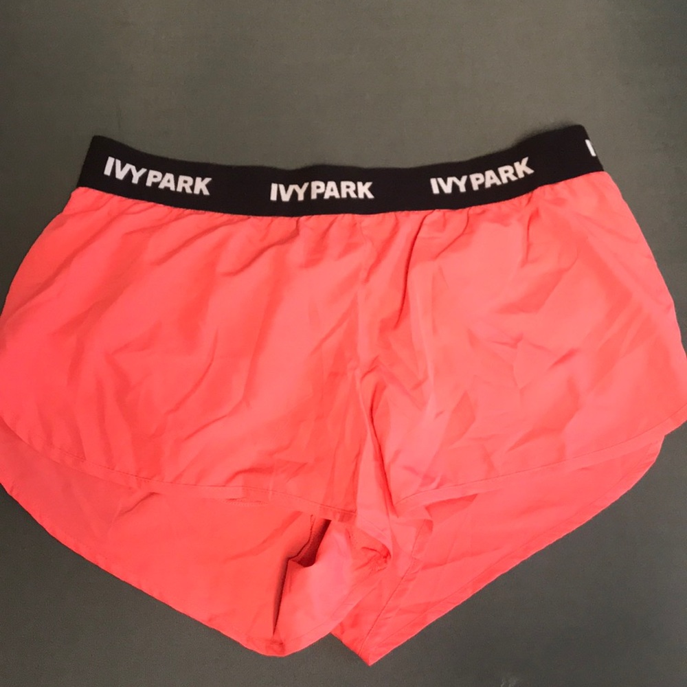 Bright pink Ivy Park gym shorts